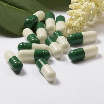 Green white capsules
